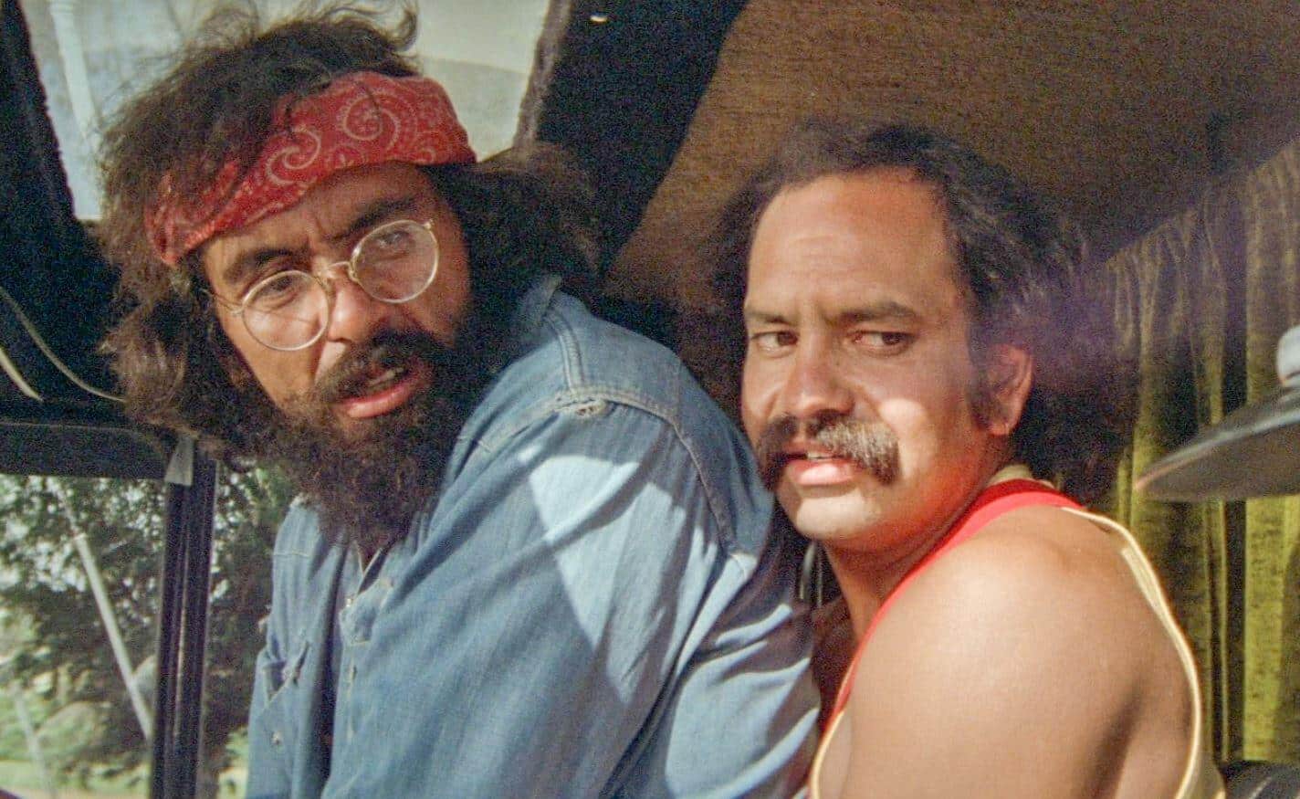 Cheech Marin and Tommy Chong in a classic scene from their iconic stoner comedy film.